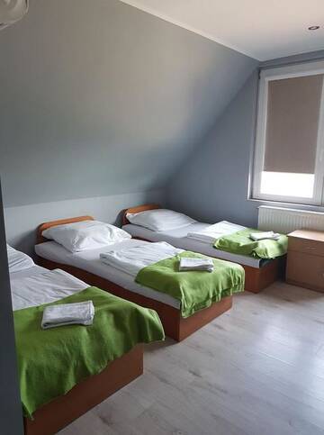 Фото номера Трехместный номер с ванной комнатой Проживание в семье Studio Relax г. Kolnik 3